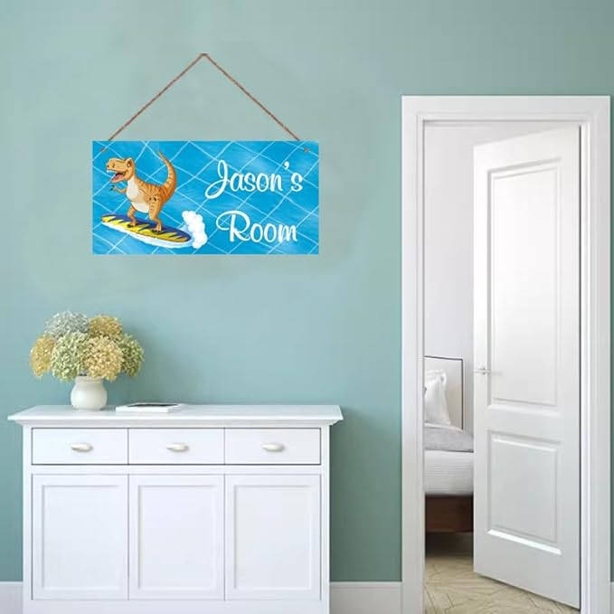 Personalized Dinosaur Sign Surf Riding Art Decor For Kids Room Custom Name Door Wall Decor, Floral Nursery Art For Boys Room Baby Bedroom Girls Cave, 5*10inch Tin Wood Wall Mount Sign