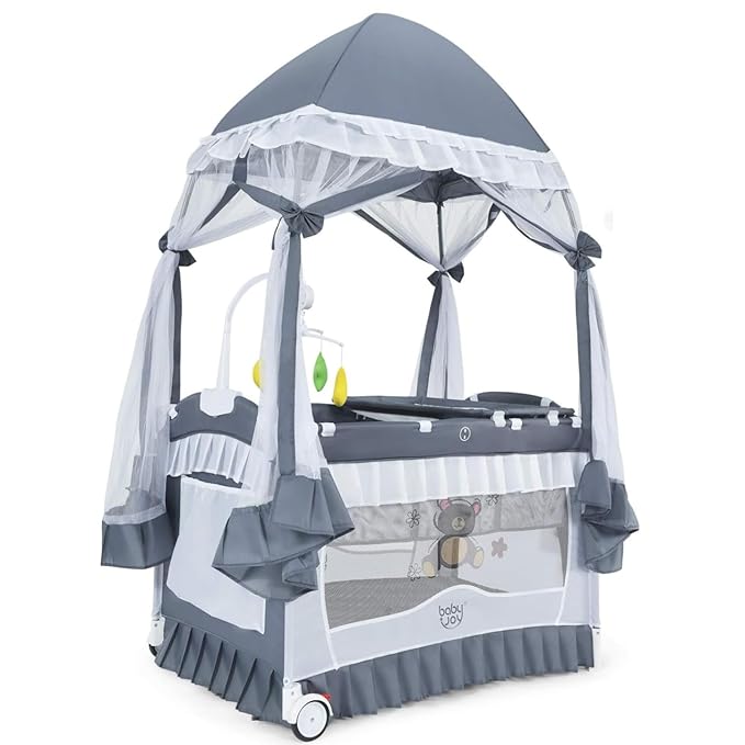 BABY JOY 4 in 1 Pack and Play with Canopy, Portable Baby Playard with Bassinet, Double-Layer Baby Crib, Wheels & Brake, Foldable Baby Girl Pink Bassinet from Newborn to Toddler