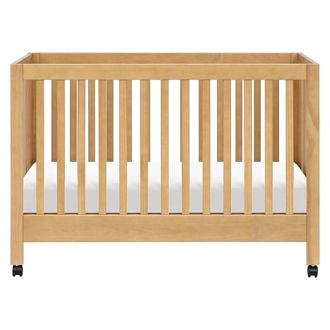 babyletto Maki 2-in-1 Portable Folding Crib with Toddler Bed Conversion Kit in Honey, Greenguard Gold Certified