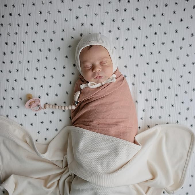 mushie Extra Soft Muslin Fitted Crib Sheet | 192 Thread Count | 28"x 52" (Black Daisy)