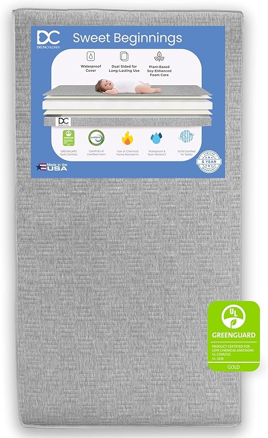 Delta Children Sloane Crib 7-Piece Baby Nursery Furniture Set–Includes: Convertible Crib, Dresser, Changing Top, Crib Mattress, Fitted Sheets, Toddler Guardrail & Changing Pad, Black w/Melted Bronze