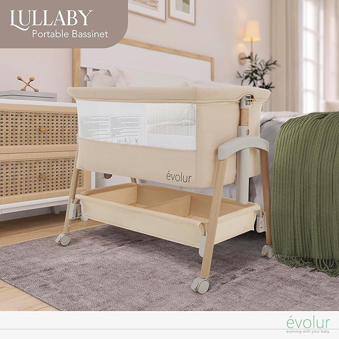 évolur Lullaby Portable Bassinet with Wheels, Adjustable Bedside Sleeper, Breathable Mesh Sides, Large Storage Basket, Easy Fold, and Travel Bag Included, Perfect for Newborns & Infants - Biege